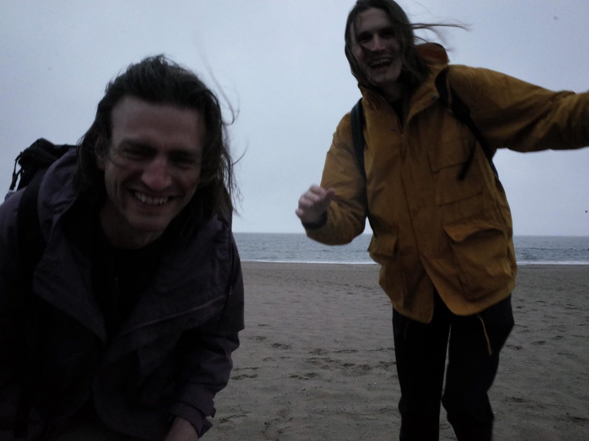 thomas bush to the left, jon auman to the right, the grey grey sea in the background